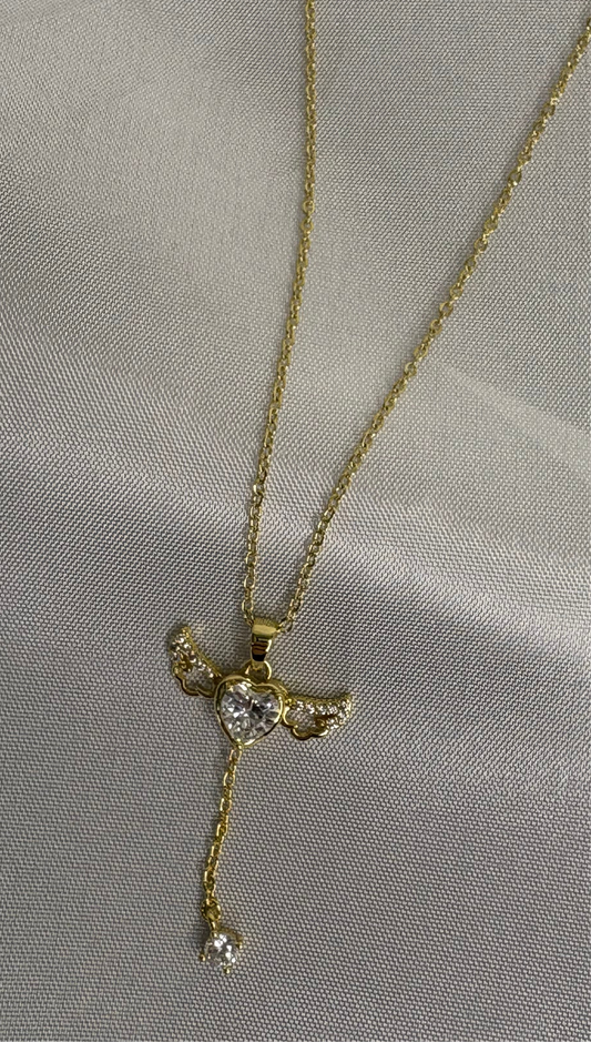 Ατσάλινο κολιέ σε χρυσό χρώμα - καρδιά με φτερά