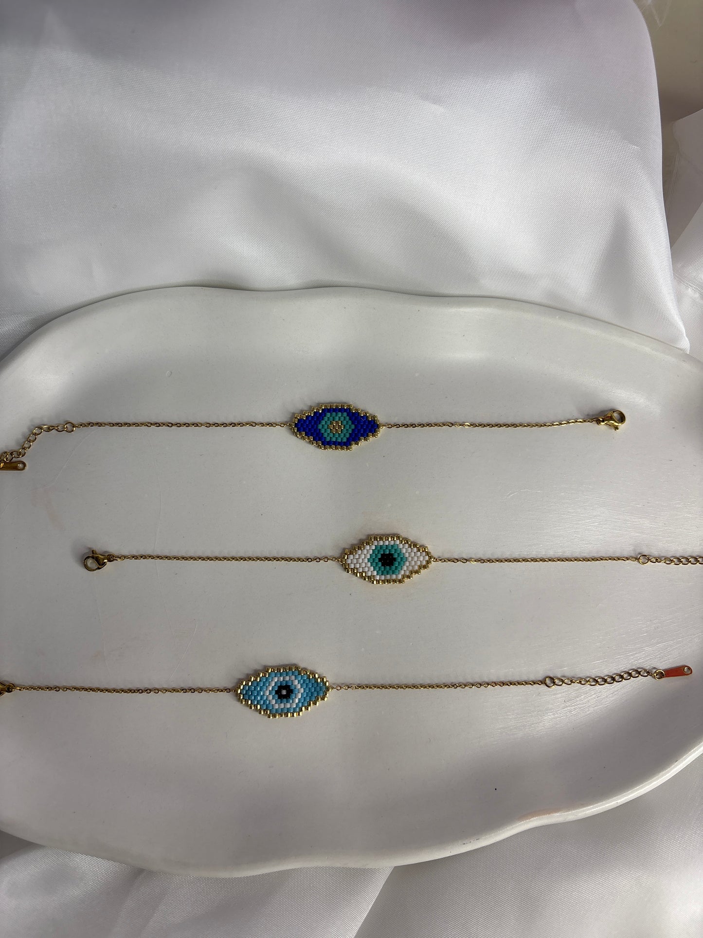 Ατσάλινο βραχιόλι με λεπτομέρεια πλεκτή