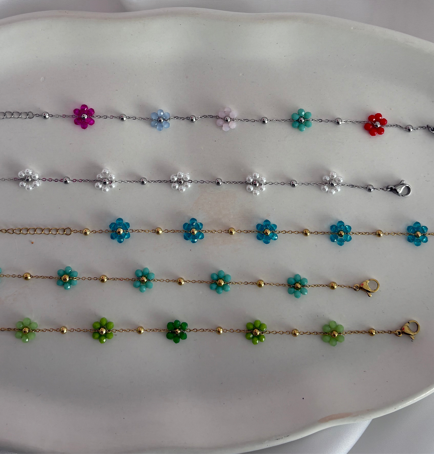 Ατσαλινο βραχιόλι με λουλουδάκια