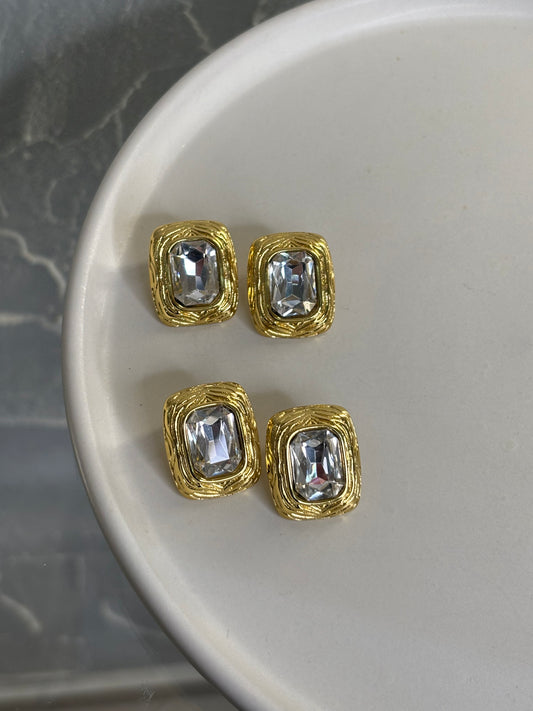 Χρύσα ατσάλινα σκουλαρίκια με ασημένια λεπτομέρεια