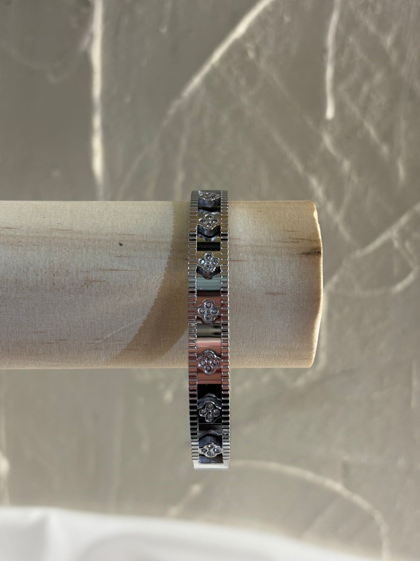 Steel handcuff with embossed designs