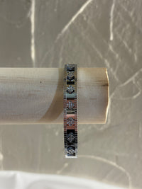 Steel handcuff with embossed designs