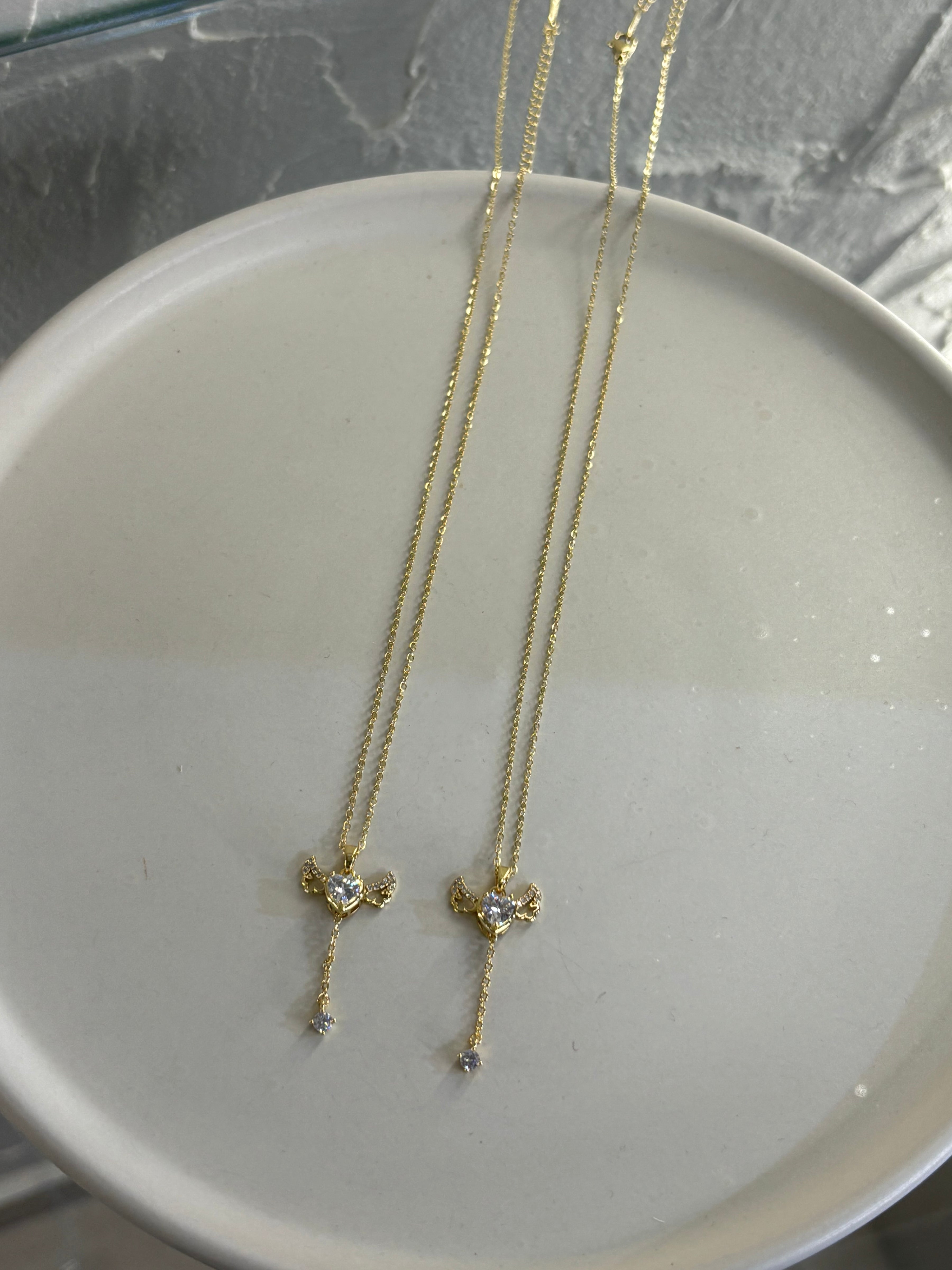 Gold steel necklace with heart pendant