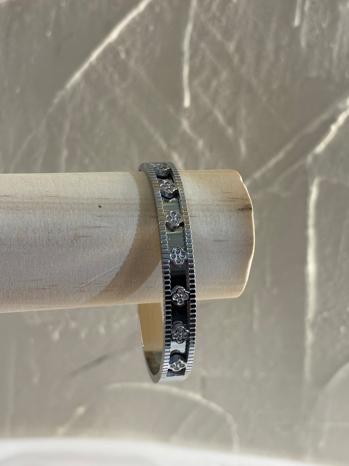 Steel handcuff with embossed designs