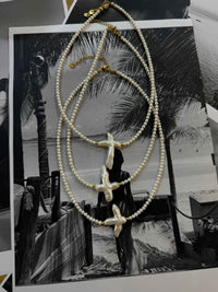 Coralia Pearl Necklace
Αληθινά μαργαριτάρια με natural pearl cross ✨