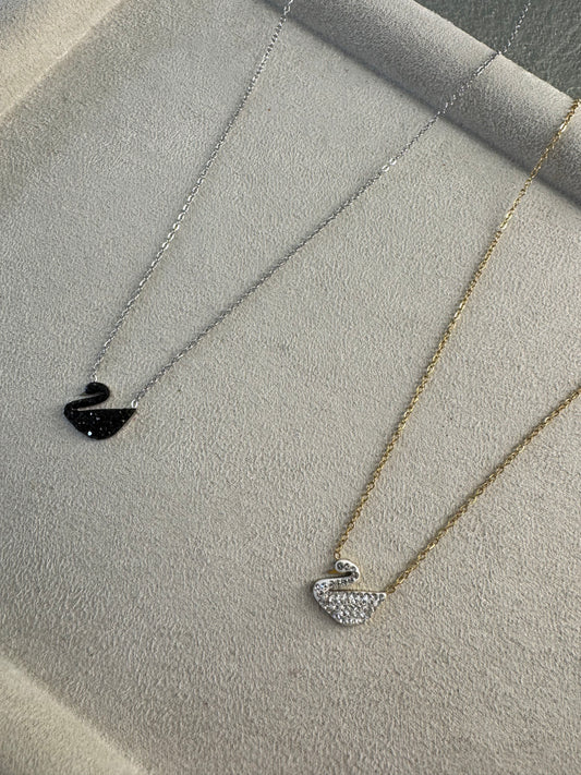 “Swan charm”